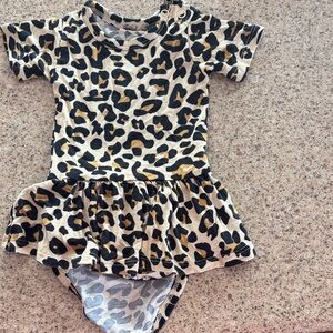Posh Peanut Leopard Print Baby Skater Romper in Cream, Black & Gold